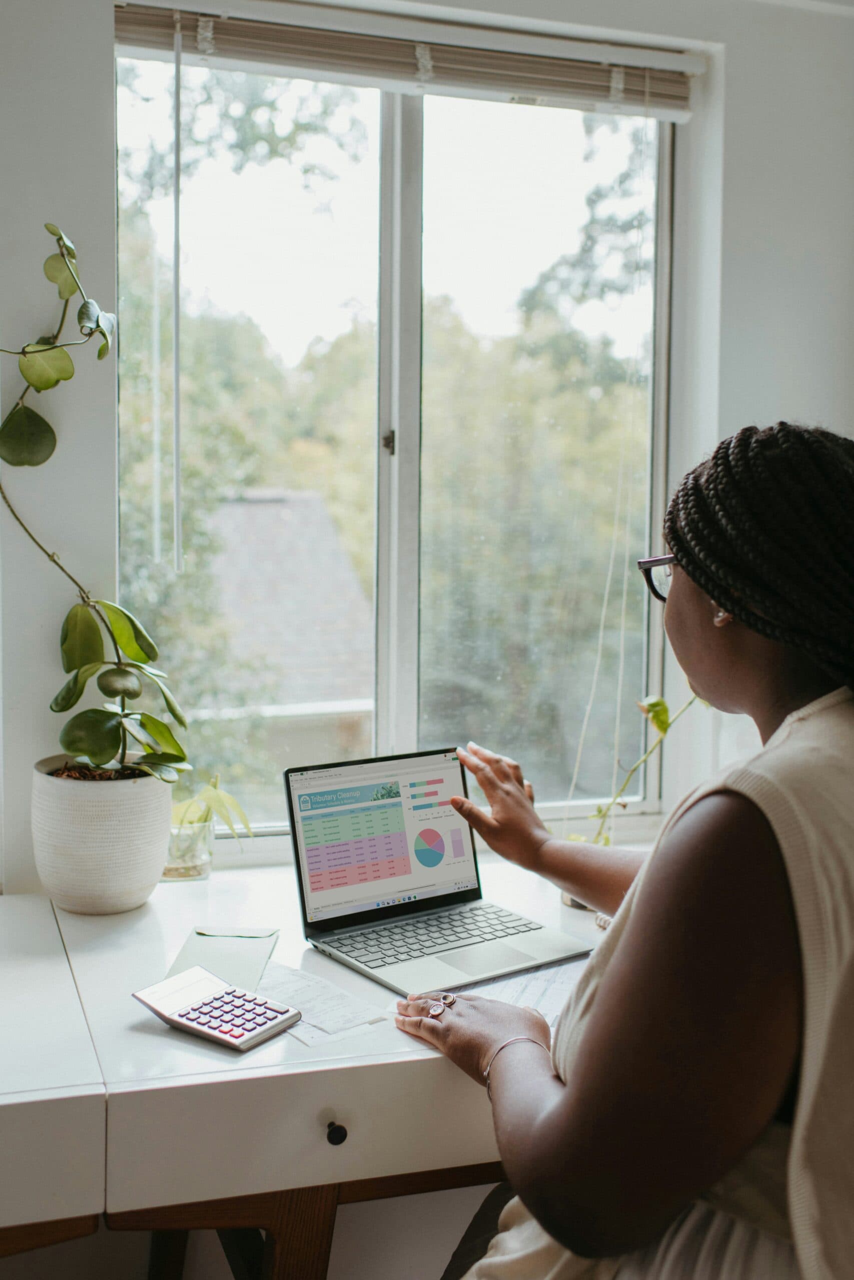 women sitting at desk reviewing coverage options